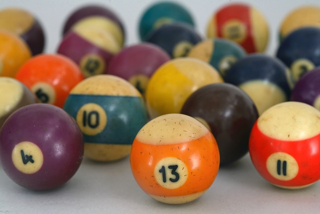 Billiard balls made of Bakelite, an early form of plastic.