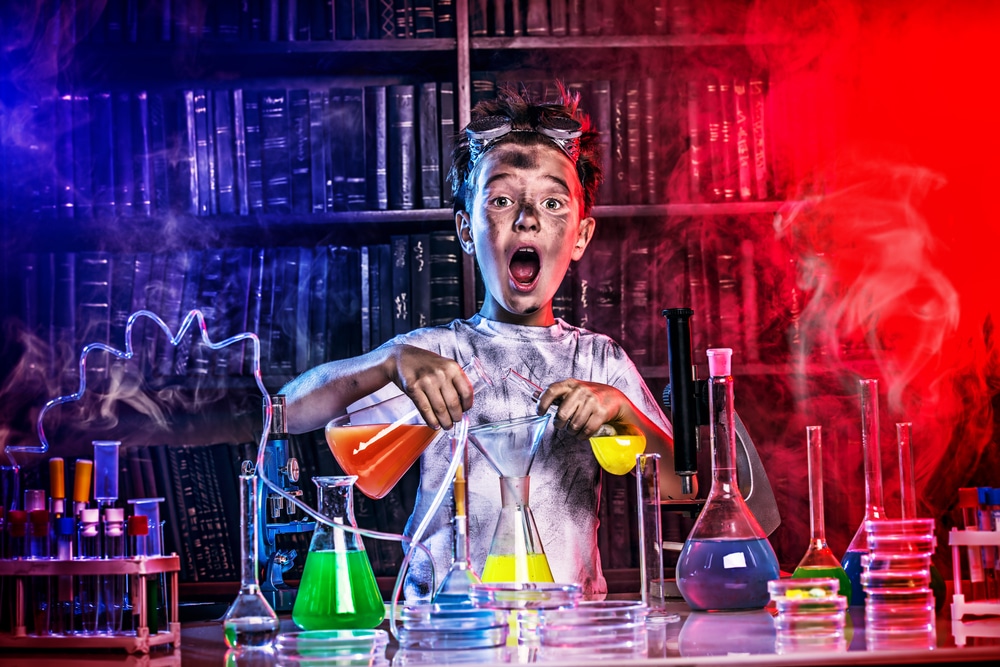 Young boy experimenting with chemicals